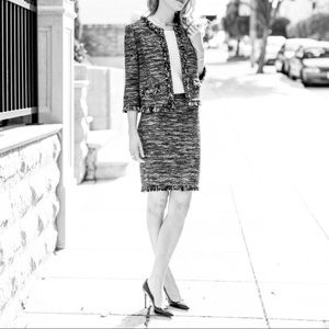 tweed jacket with fringe. Black,white, pastel mix